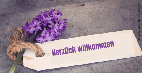 Herzlich willkommen - Schild